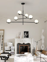modern-metal-and-glass-globe-pendant-light-for-dining-room-in-gold-and-black-finish