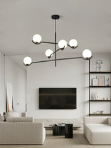 modern-metal-and-glass-globe-pendant-light-for-dining-room-in-gold-and-black-finish