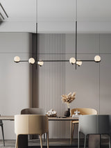 modern-metal-and-glass-globe-pendant-light-for-dining-room-in-gold-and-black-finish