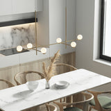 modern-metal-and-glass-globe-pendant-light-for-dining-room-in-gold-and-black-finish