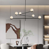 modern-metal-and-glass-globe-pendant-light-for-dining-room-in-gold-and-black-finish