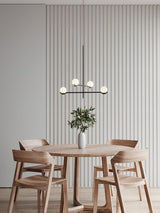 modern-metal-and-glass-globe-pendant-light-for-dining-room-in-gold-and-black-finish