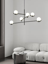 modern-metal-and-glass-globe-pendant-light-for-dining-room-in-gold-and-black-finish