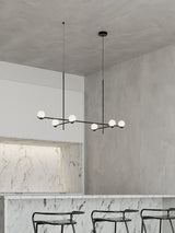 modern-metal-and-glass-globe-pendant-light-for-dining-room-in-gold-and-black-finish