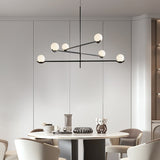 modern-metal-and-glass-globe-pendant-light-for-dining-room-in-gold-and-black-finish