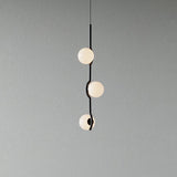 modern-metal-and-glass-globe-pendant-light-for-dining-room-in-gold-and-black-finish