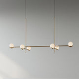 modern-metal-and-glass-globe-pendant-light-for-dining-room-in-gold-and-black-finish