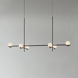 modern-metal-and-glass-globe-pendant-light-for-dining-room-in-gold-and-black-finish
