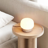 Modern Yellow Travertine Stone Table Lamp with Glass Globe for Minimalist Bedside Decor