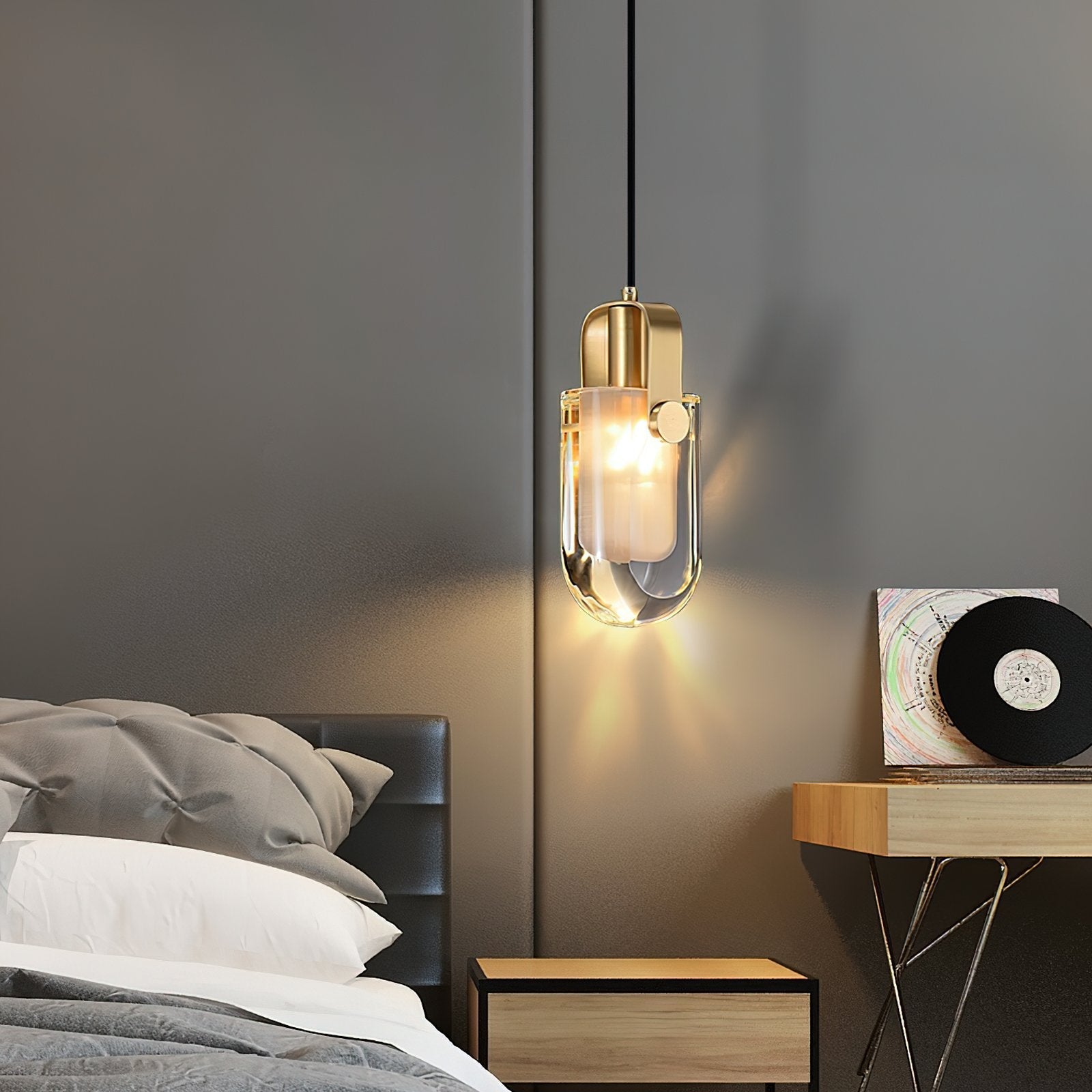 modern-oval-droplet-crystal-pendant-light-with-gold-brass-finish-for-luxury-dining-and-bedroom