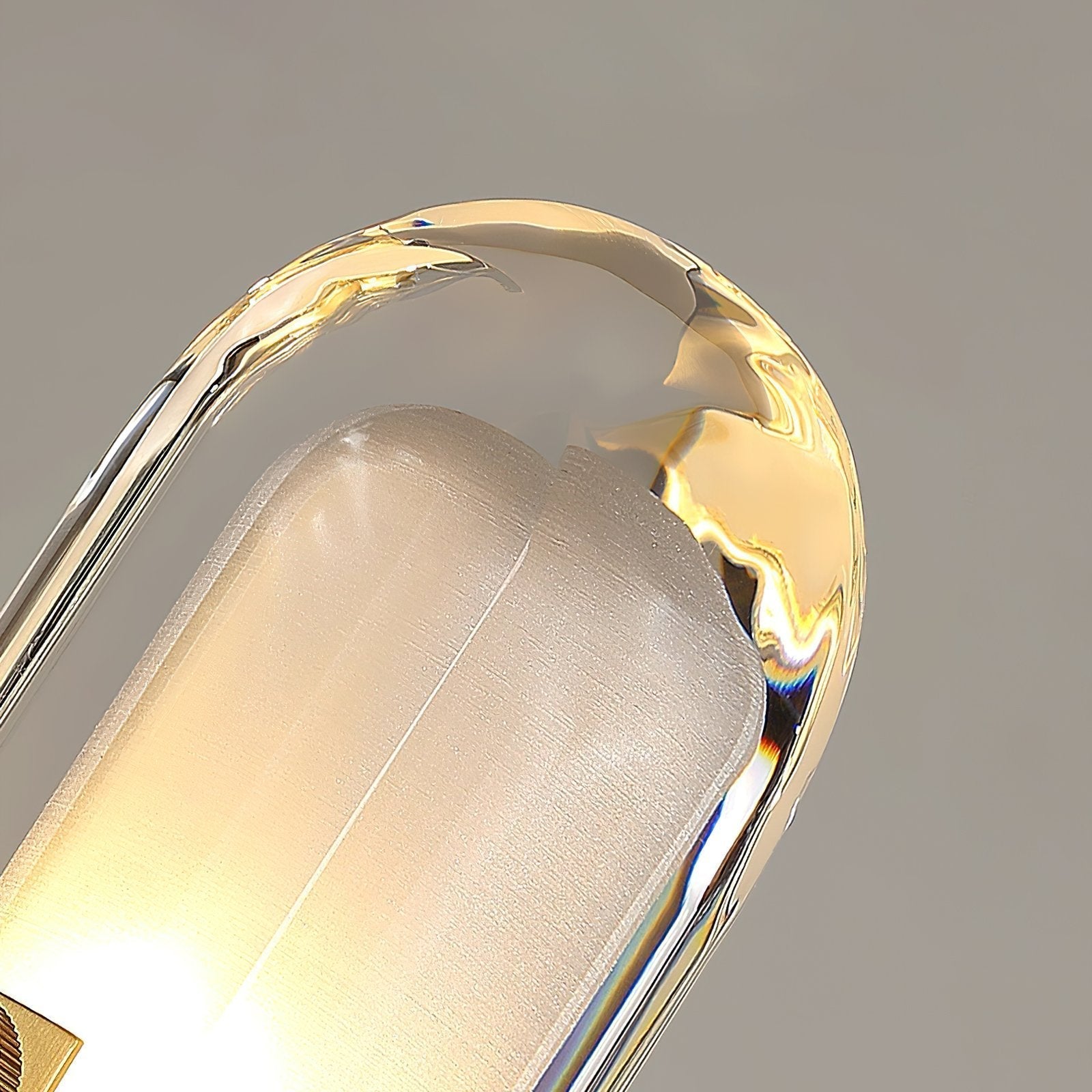 modern-oval-droplet-crystal-pendant-light-with-gold-brass-finish-for-luxury-dining-and-bedroom