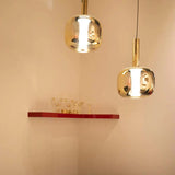 modern-dusk-dawn-blown-glass-led-pendant-light-with-geometric-conic-base