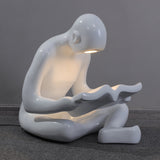 artistic-figurine-resin-floor-light-for-contemporary-interiors-and-reading-spaces