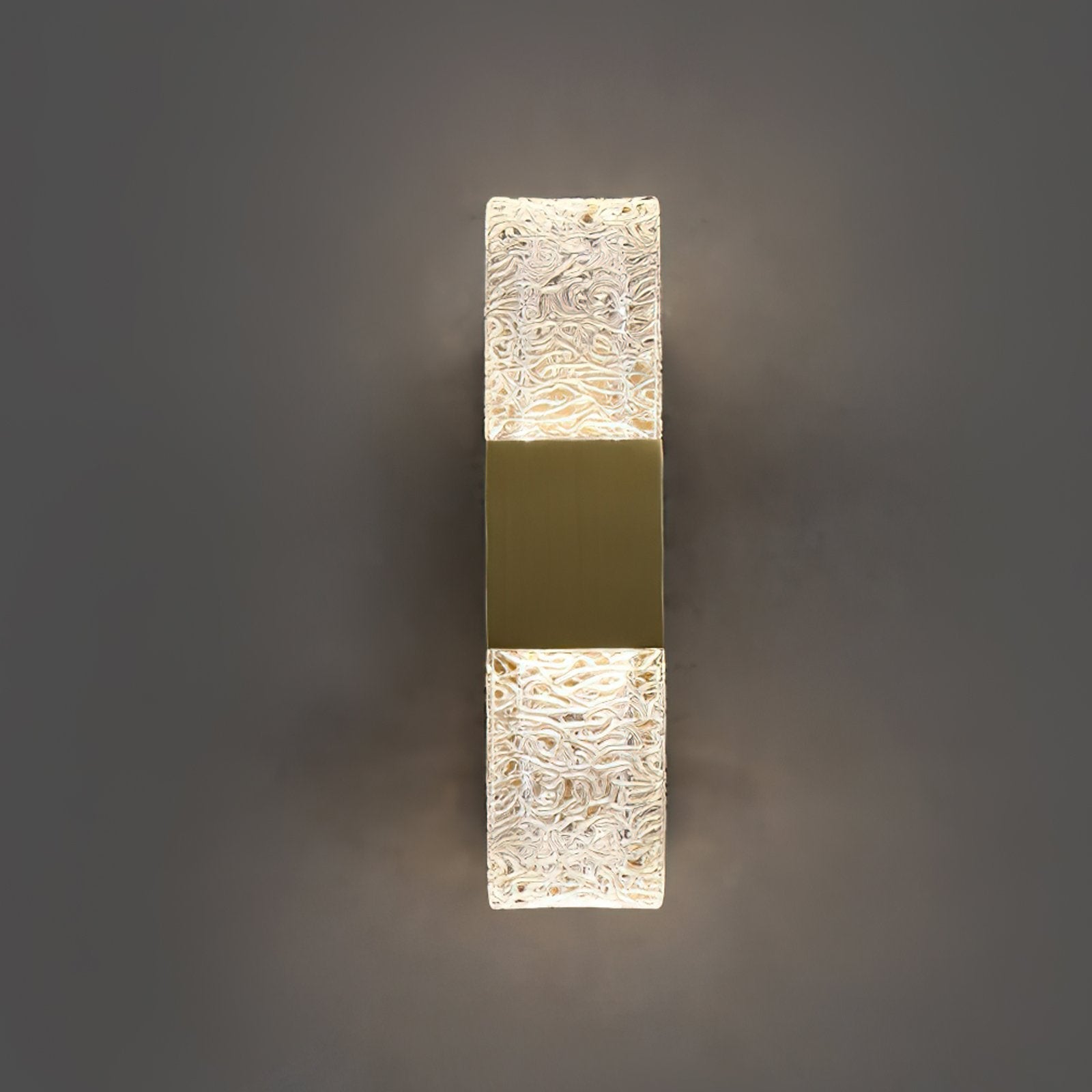 modern-luxury-oval-glass-wall-sconce-with-textured-ice-glass-and-brass-finish-integrated-led-lighting
