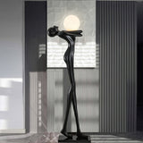 Modern Artistic Figure Floor Lamp with White Glass Globe Sculpture Standing Light