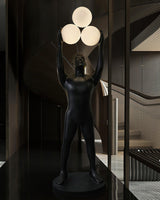 Artistic Humanoid Figure Standing Lamp with Triple Glass Spheres for Modern Living Room
