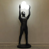 Artistic Humanoid Figure Standing Lamp with Triple Glass Spheres for Modern Living Room