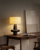 modern-eyelet-table-lamp-with-solid-wood-base-and-white-cloth-shade-for-bedside-lighting