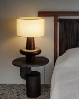 modern-eyelet-table-lamp-with-solid-wood-base-and-white-cloth-shade-for-bedside-lighting
