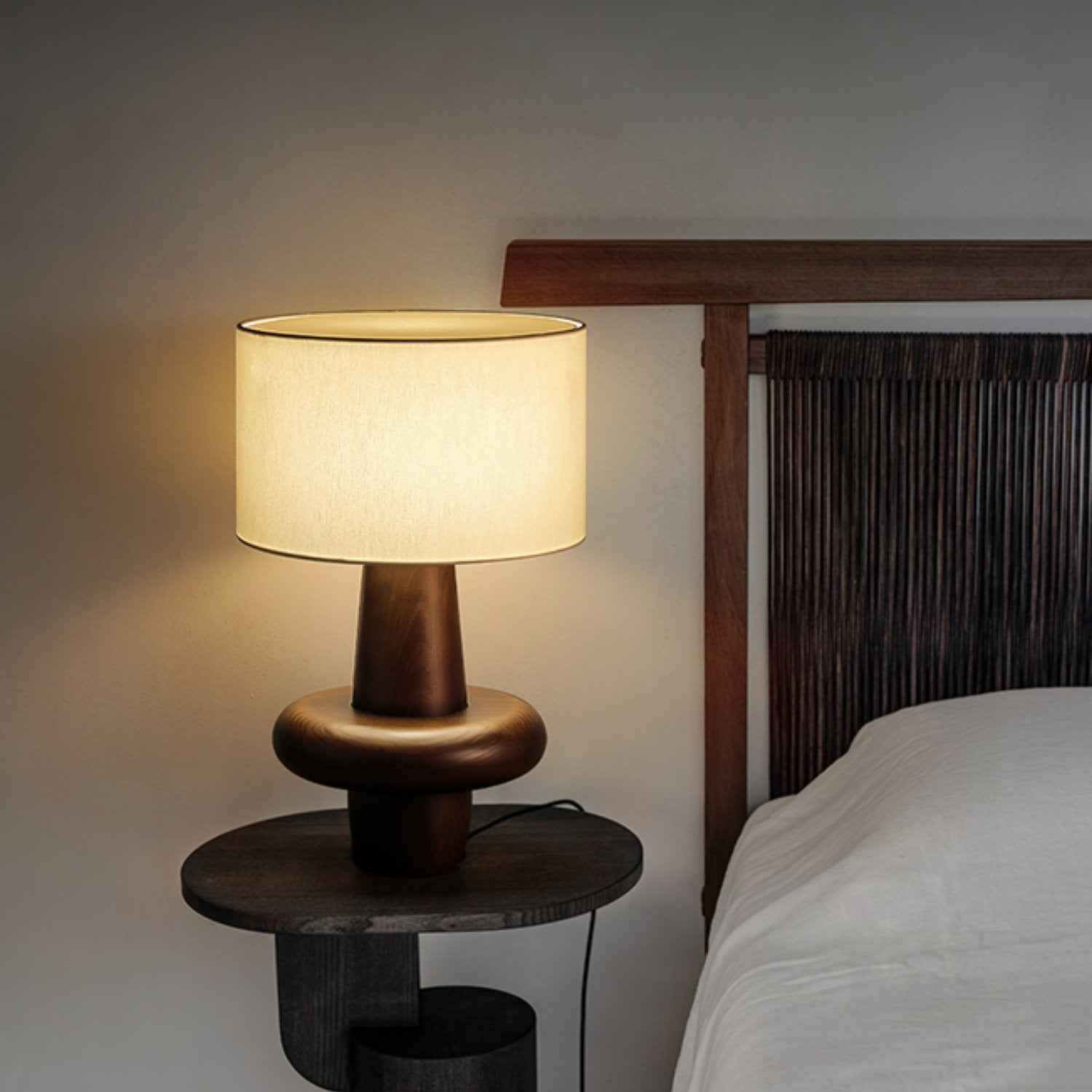 modern-eyelet-table-lamp-with-solid-wood-base-and-white-cloth-shade-for-bedside-lighting
