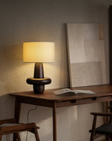 modern-eyelet-table-lamp-with-solid-wood-base-and-white-cloth-shade-for-bedside-lighting