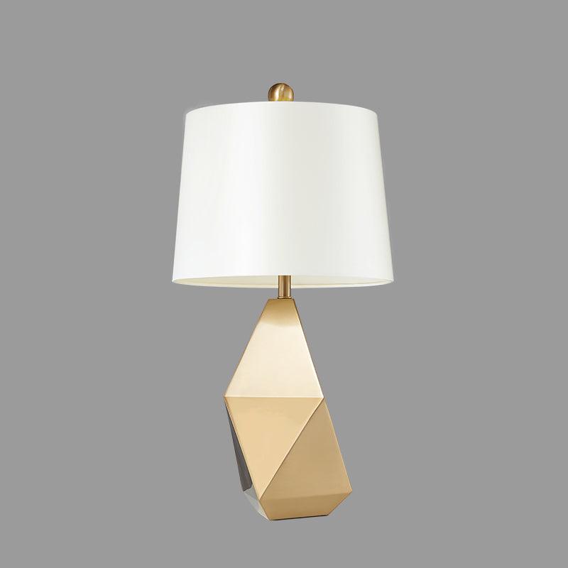 modern-gold-asymmetrical-faceted-table-lamp-with-polyhedral-metal-base-and-fabric-shade