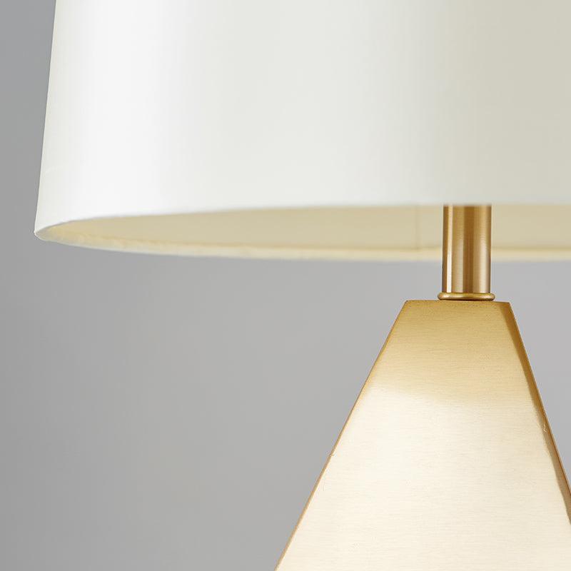 modern-gold-asymmetrical-faceted-table-lamp-with-polyhedral-metal-base-and-fabric-shade