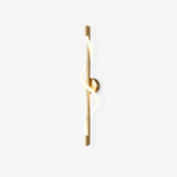 modern-spiral-led-wall-sconce-with-flexible-silicone-curve-and-brass-accents