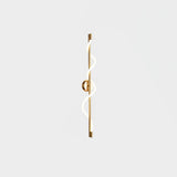 modern-spiral-led-wall-sconce-with-flexible-silicone-curve-and-brass-accents
