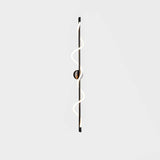 modern-spiral-led-wall-sconce-with-flexible-silicone-curve-and-brass-accents
