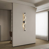 modern-spiral-led-wall-sconce-with-flexible-silicone-curve-and-brass-accents