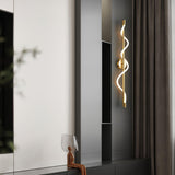 modern-spiral-led-wall-sconce-with-flexible-silicone-curve-and-brass-accents