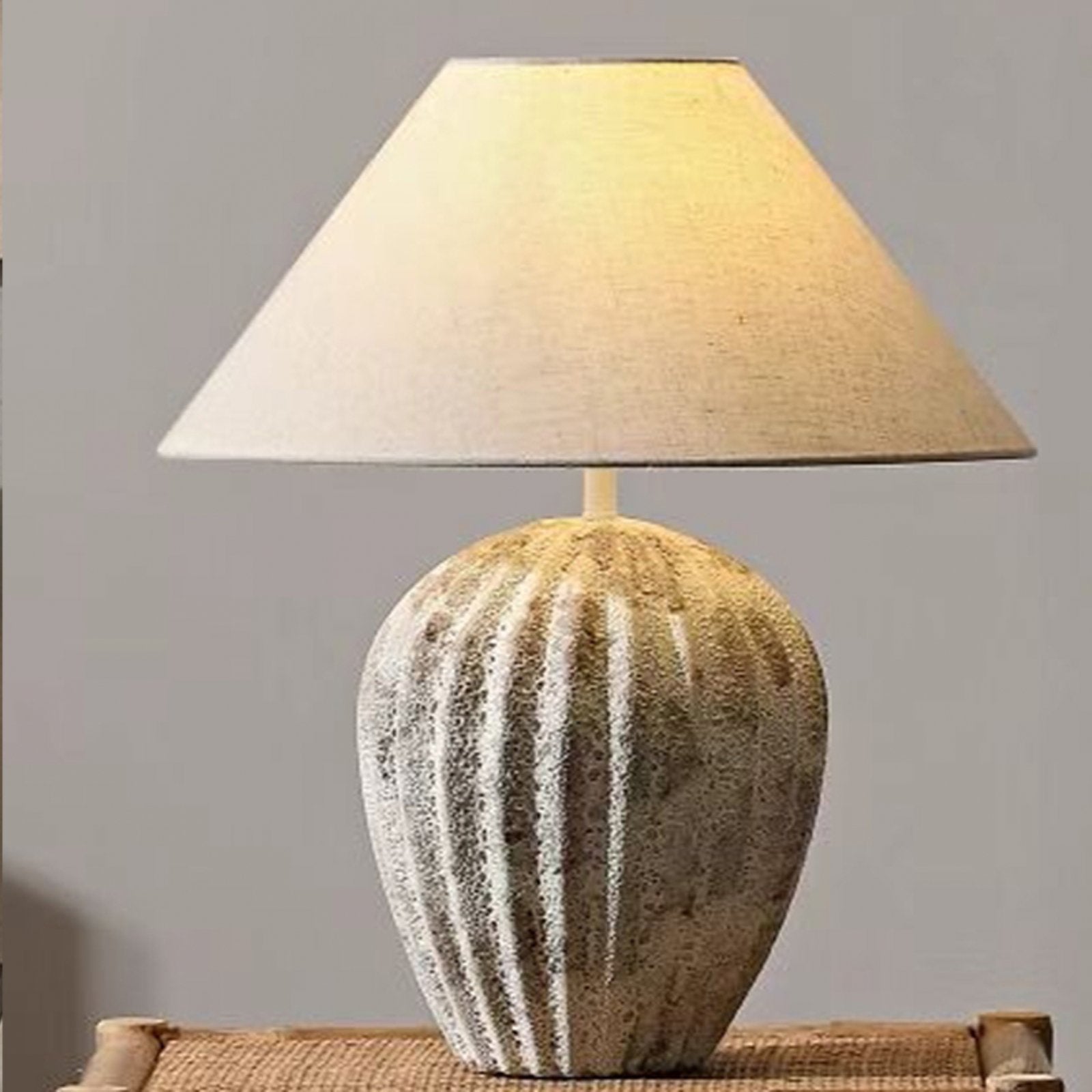 modern-bulbous-ceramic-table-lamp-with-pleated-fluted-texture-and-fabric-shade