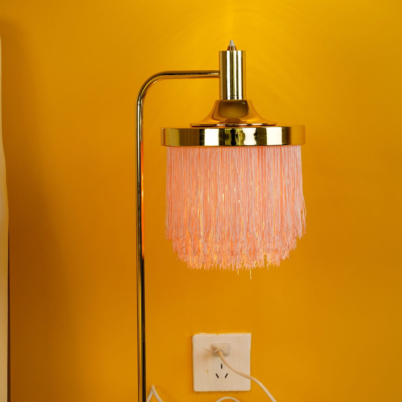 modern-nordic-tassel-fringe-table-lamp-with-pink-skirt-and-copper-metal-base