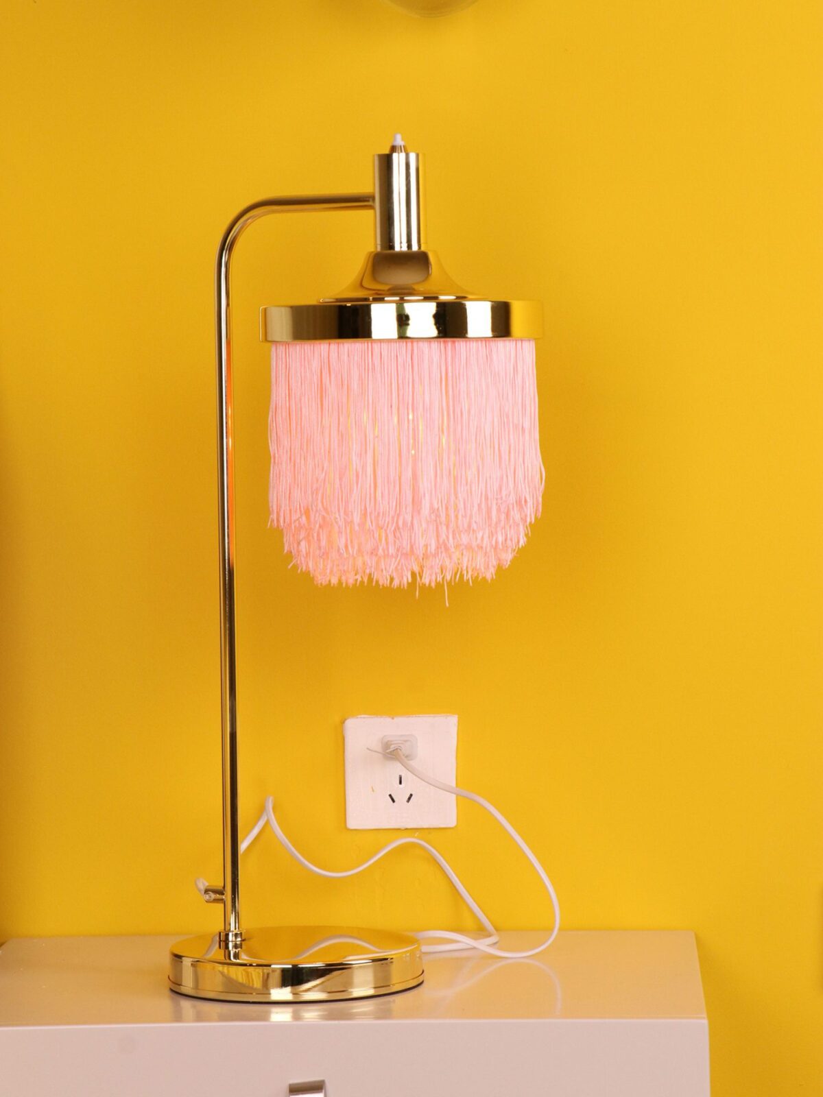 modern-nordic-tassel-fringe-table-lamp-with-pink-skirt-and-copper-metal-base