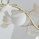luxury-ginkgo-leaf-linear-chandelier-gold-metal-bar-light-with-white-ceramic-petal-shades
