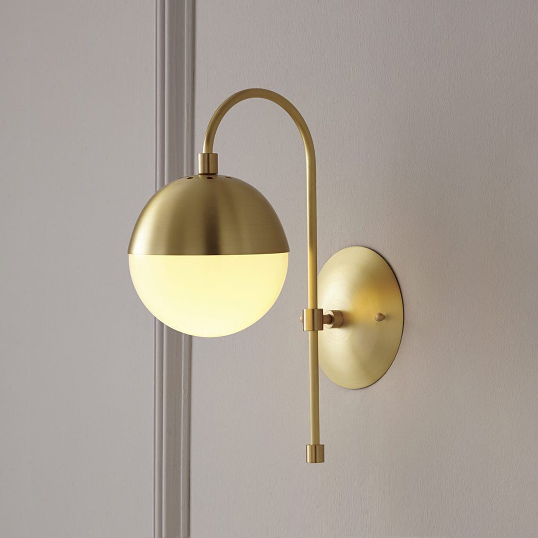 elegant-opaque-glass-globe-wall-sconce-with-brass-finish-modern-indoor-lighting-for-bedrooms-and-living-rooms