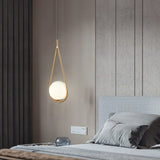 modern-nordic-glass-ball-pendant-light-with-elegant-gold-hoop-for-indoor-decor