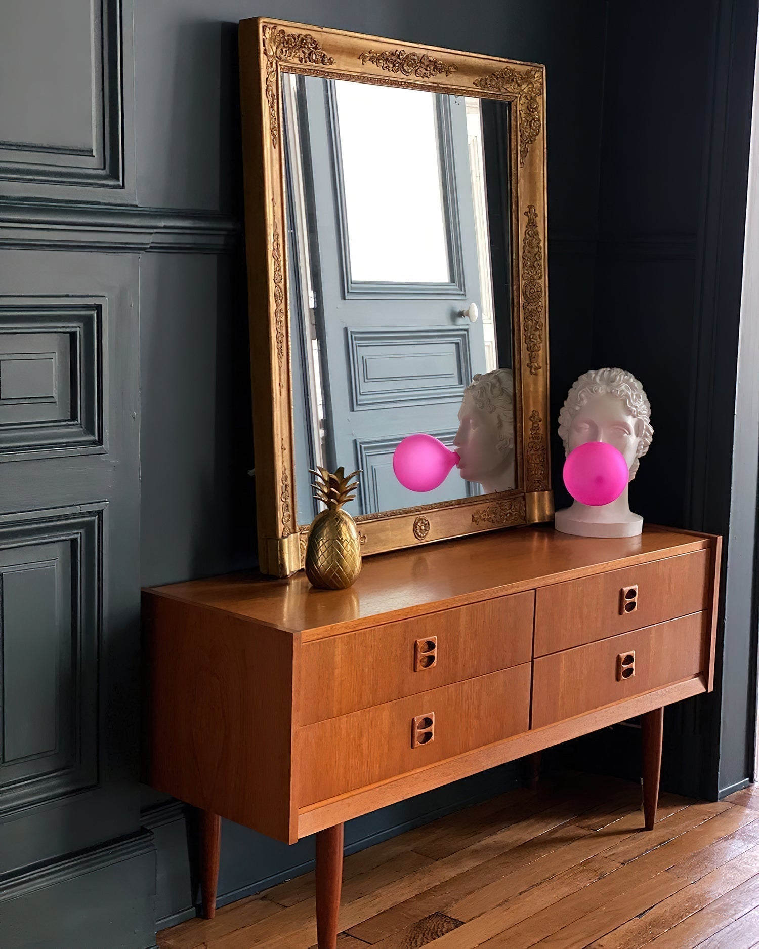 Modern Grace Portable Table Lamp with Pink Glass Globe and White Resin Bust Sculptural Base