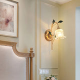 elegant-green-leaf-floral-sconce-wall-light-with-glass-petal-and-crystal-accents