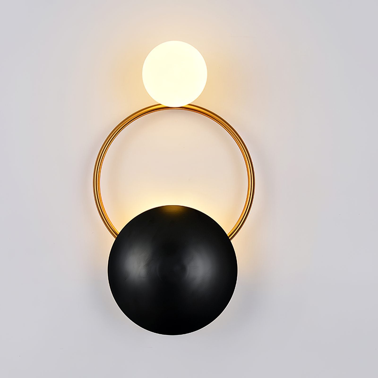 modern-geometric-circle-design-wall-sconce-gold-and-black-indoor-accent-lighting
