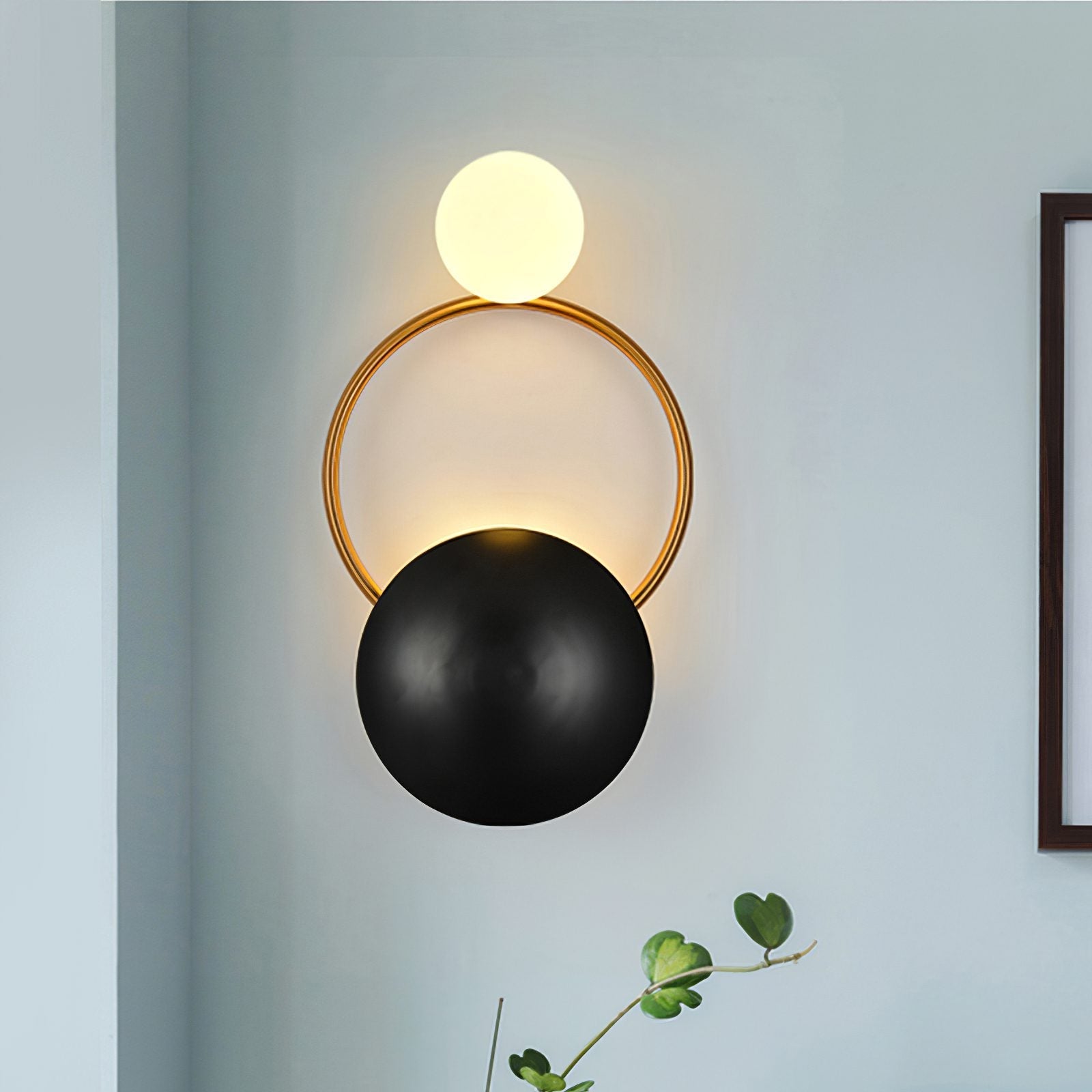 modern-geometric-circle-design-wall-sconce-gold-and-black-indoor-accent-lighting