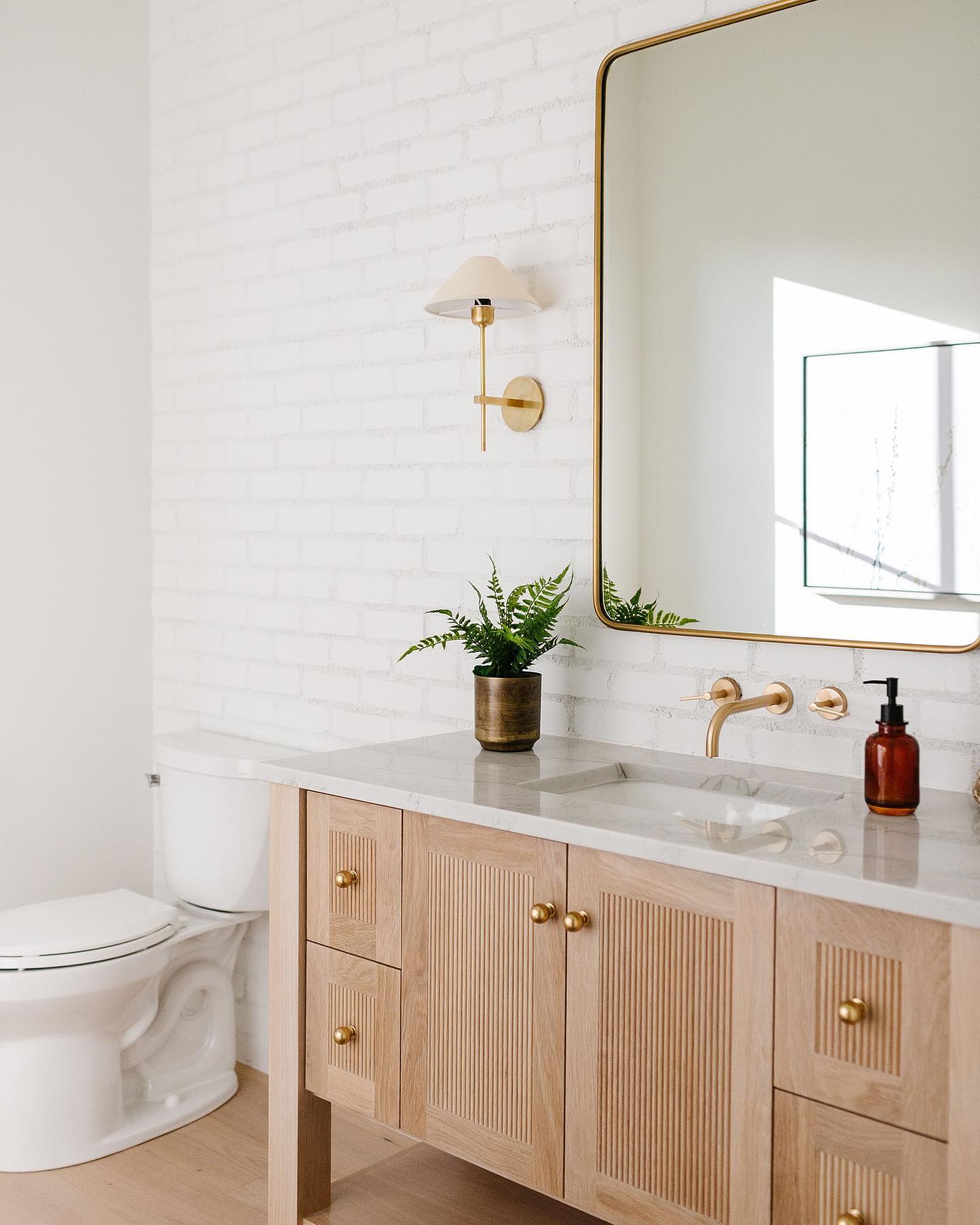 modern-brass-wall-sconce-with-triangular-fabric-shade-hackney-style-light