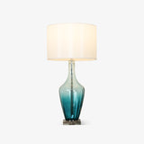 Modern Azure Blue Glass Table Lamp with Crystal Accents and Beige Linen Drum Shade