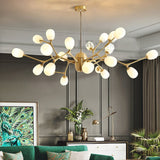 modern-brass-chandelier-with-pearl-glass-shades-and-elegant-curved-arms