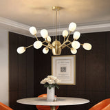 modern-brass-chandelier-with-pearl-glass-shades-and-elegant-curved-arms