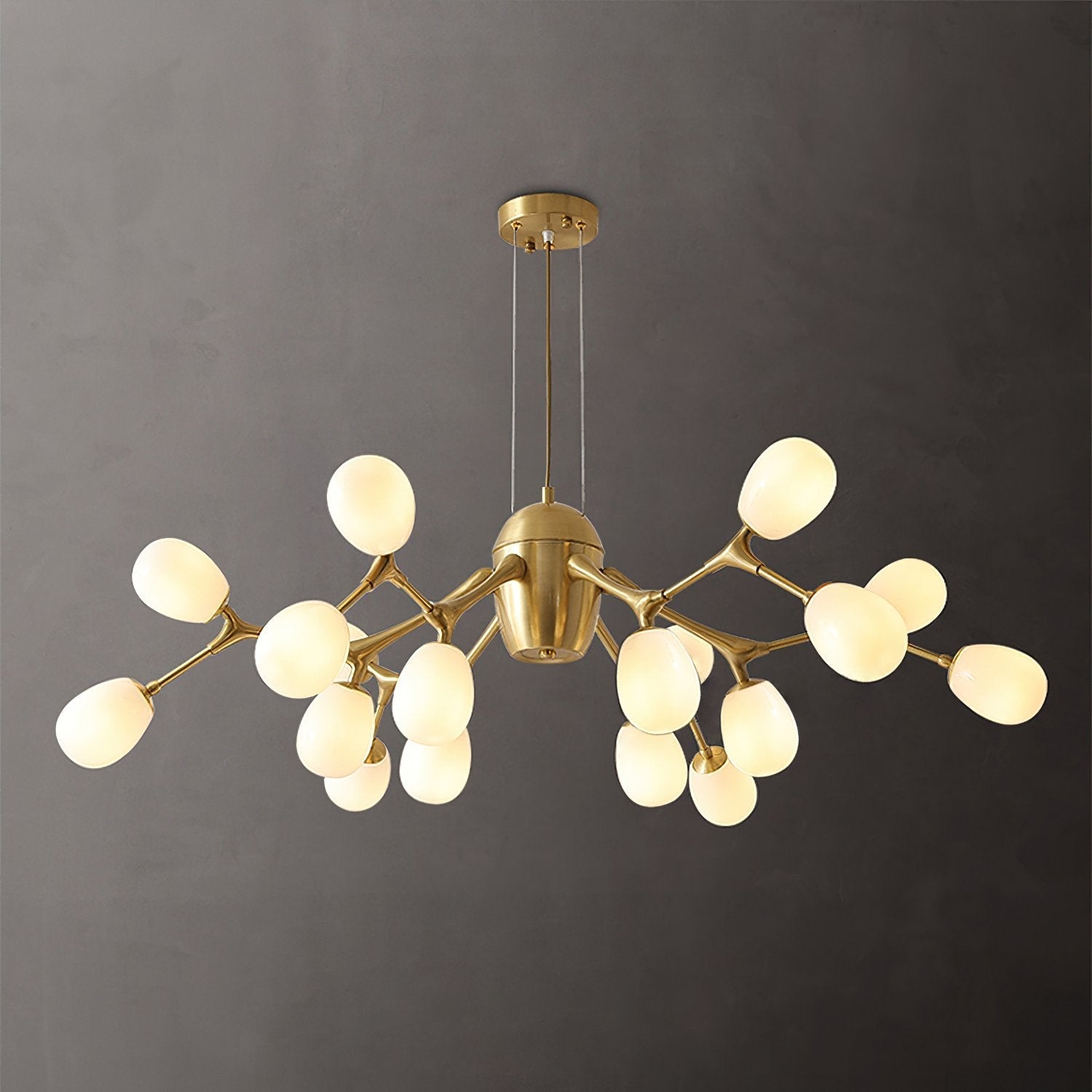 modern-brass-chandelier-with-pearl-glass-shades-and-elegant-curved-arms