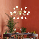 modern-brass-chandelier-with-pearl-glass-shades-and-elegant-curved-arms