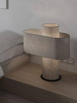 Heron Minimalist Drum Table Lamp Ivory Fabric Shade Black Metal Base for Home Decor