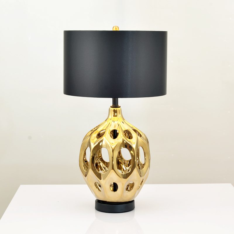 modern-ceramic-table-lamp-with-hollow-design-and-fabric-drum-shade-for-elegant-interior-lighting-decor